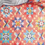 The Pioneer Woman Orange Starlight Patchwork King Bed Cotton Quilt, Comforter. Fixed Price $76.88.