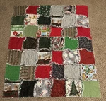 Small Christmas Rag Quilt With Grinch, Puppies, Etc. Fixed Price $40.00.