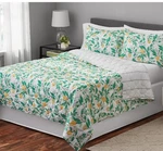 Mainstays Lemon Pattern Reversible Quilt King Size 104" X 90". Fixed Price $48.99.