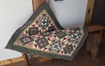 Prairie Road Magic Patchwork Hand Quilted Cotton 43"X 33" Log Cabin. Fixed Price $65.00.