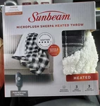Sunbeam Microplush Sherpa Electric Heated Throw Blanket-black/white Plaid 50X60. Fixed Price $29.88.