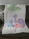 Handmade Embroidered Cotton Dinosaur Crib Quilt White Purple Blue Pink Green. Fixed Price $65.00.