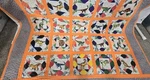 Quilt Jurassic World Embroidered Dinosaurs Orange 50X92. Fixed Price $175.00.