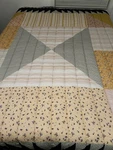 Urban Outfitters Valentina Mixed Print Reversible Quilt. Fixed Price $35.00.
