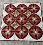 Quilted 2005 Spring Fancy Nicole Gunson Paper Pieced Applique 50X50 Signed. Fixed Price $99.00.