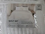 Twin Great Bay Home 2-PIECE Detailed Channel Stitch Quilt Set With Sham White. Fixed Price $14.00.